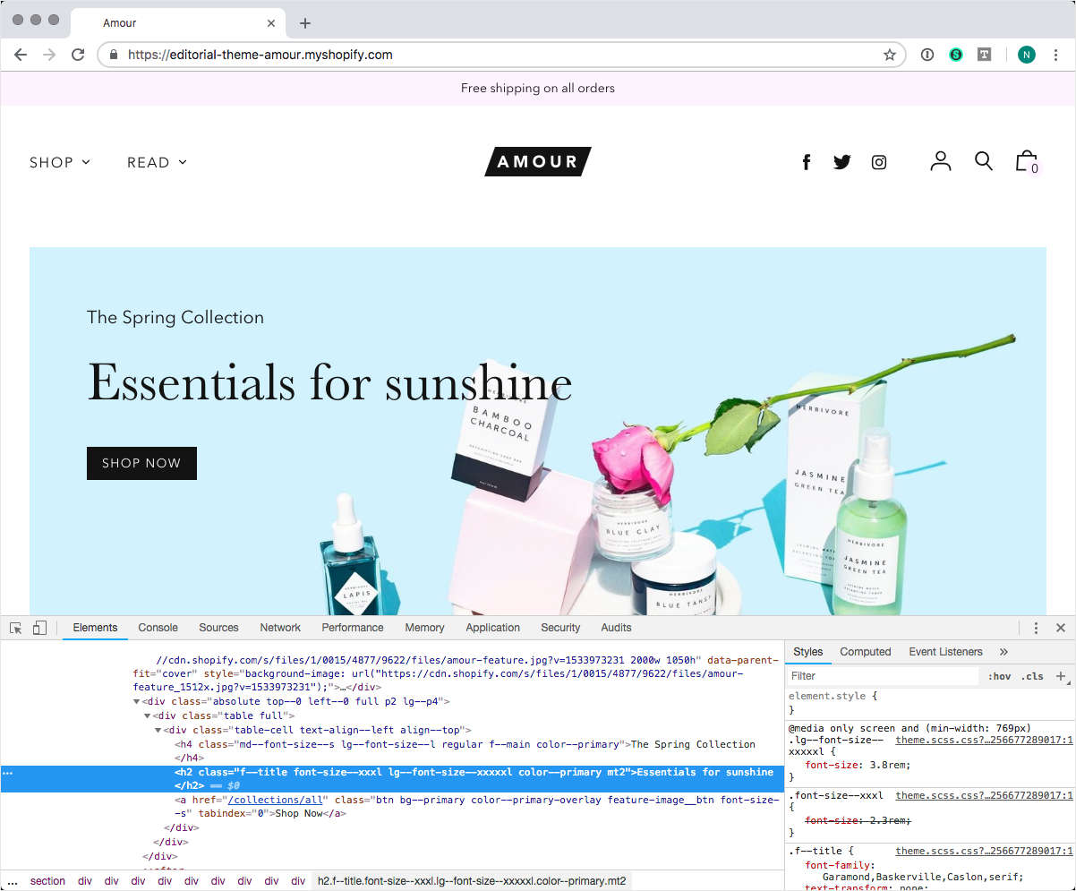 Homepage for Editorial's Amour demo store with a font size element selected in web inspector.