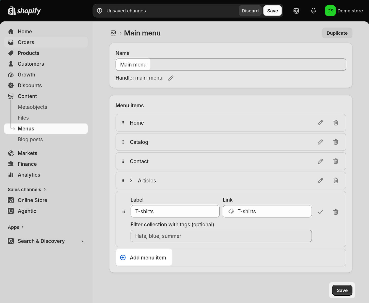 The Add menu item area with the T-shirts label and a link to the T-shirts collection page in Shopify admin.