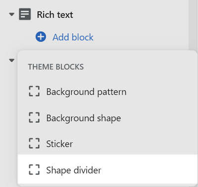A Shape divider block added to a Rich text section in Theme editor.